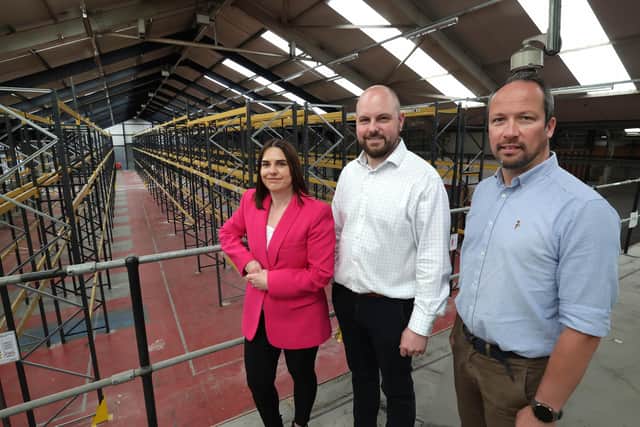 NI logistics firm UDS Group signs lease at new premises in £350k investment: Pictured are Lisa McAteer, senior director at CBRE NI, Chris Hutchinson, managing director, UDS Group and Paul Mulholland, property director at Heron Property Ltd