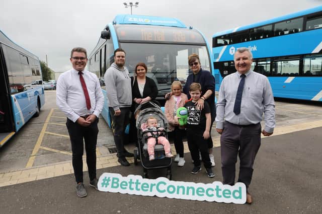 Sam Todd (on right), service delivery manager, Translink and Peter O'Hare, assistant service delivery manager, with the Wheeler family alongside the Translink Zero Emission buses now in service at Coleraine Bus Station.