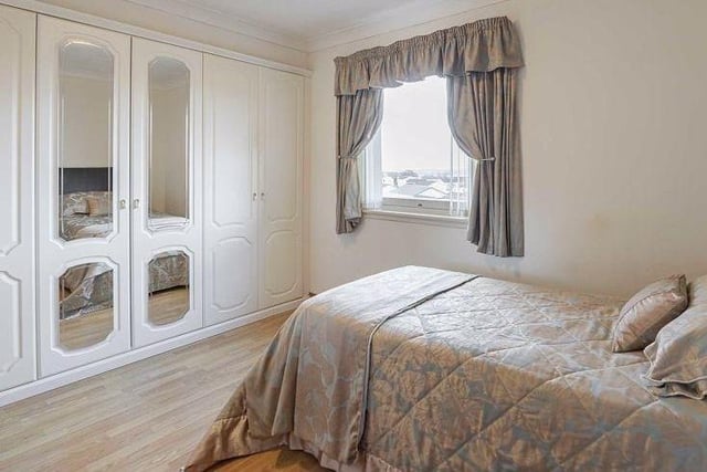 A room with a view, this boudoir not only offers ample space for a generous bed but also built in wardrobes for all your storage needs.