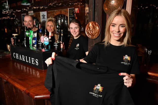 Una Burns, manager and third generation of family owned Charlie’s Bar Enniskillen is joined by team members Paul Wright, Debra Ponting and Aoibhe Judge as it is announced that the bar has teamed up with local embroidery company, Ted and Stitch, to launch of a limited edition apparel range after the bar’s Christmas advert went viral around the world and captured the hearts of millions of people.  All profits from the sales in December will go directly to Age NI and the South West Age Partnership (SWAP)