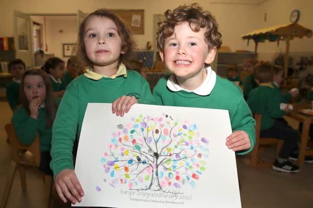 Pupils celebrate the official opening of  Bangor Integrated Nursery School