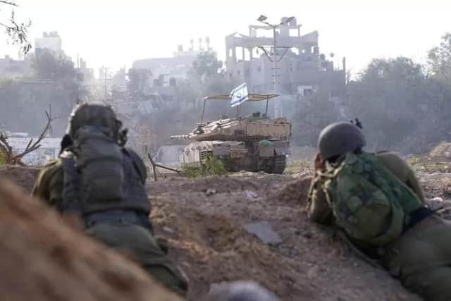 A general view of Israeli soldiers and a tank, released by the IDF