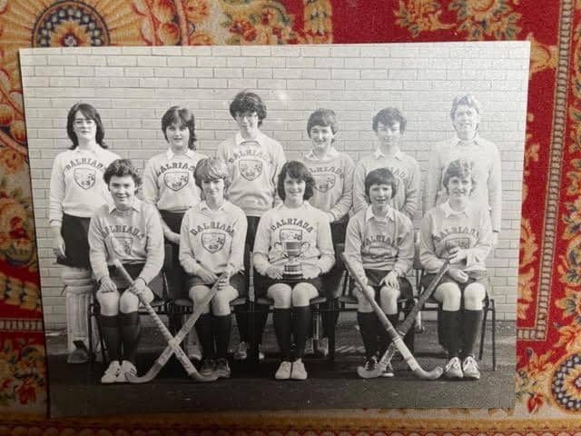 The album features several pictures of girls' hockey teams (some are labelled with late 1970’s and early 1980’s dates). In a couple of the photos, the girls are wearing Dalriada shirts.