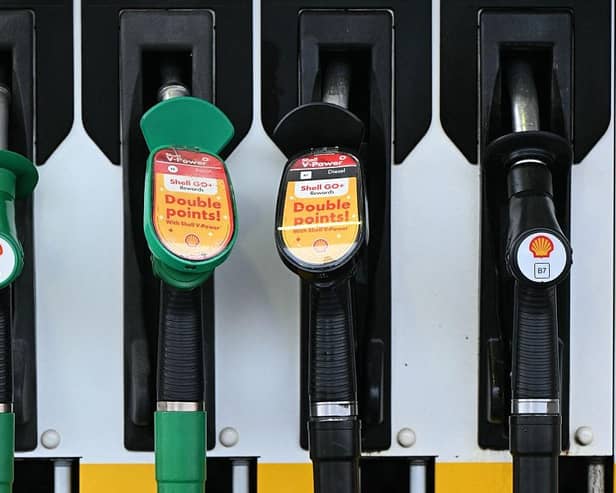 Petrol and diesel prices are both at high levels and holding steady (photo by Oli SCARFF / AFP via Getty Images)