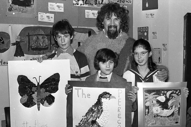 Pictured in November 1982 are Gina Giles, Darren Billings and Kenneth Adams from Rostulla Special School with Scottish comedian Billy Connolly after he presented them with their prizes in the Belfast Festival Design A Record Sleeve competition. Picture: News Letter archives