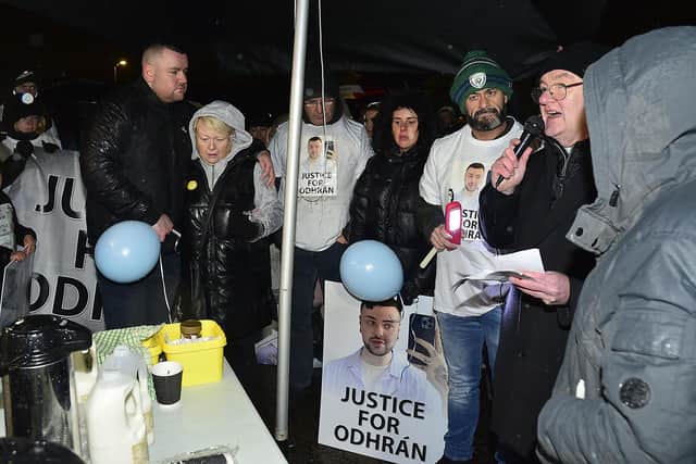A crowd began gather in the rain on Edward Street in Lurgan, where Odhrán Kelly's body was found on Sunday. Picture By: Arthur Allison: PacemakerPress.