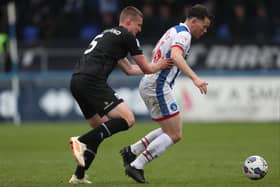 Barrow's Sam McClelland (left) battles with Hartlepool United's Connor Jennings during the Sky Bet League 2 match between Hartlepool United and Barrow at Victoria Park, Hartlepool in April