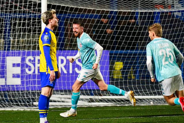 Ronan Doherty celebrates his match-winning strike for Larne against Bangor. (Photo by Andrew McCarroll/Pacemaker Press)