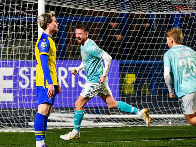 Ronan Doherty celebrates his match-winning strike for Larne against Bangor. (Photo by Andrew McCarroll/Pacemaker Press)