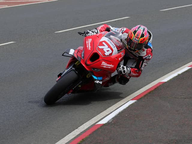Davey Todd set a new lap record in the Superstock class at the North West 200 on his way to victory on the Milwaukee BMW