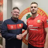 Niall Currie welcomes new signing Zach Barr to Portadown. PIC: Portadown FC