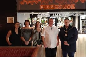 A Glengormley restaurant has reopened after a devastating accidental fire in 2022 left the owners, staff and community in shock. Pictured is Mayor of Antrim and Newtownabbey, councillor Mark Cooper with Kevin and Gina McCourt and their daughters Nicole and Ashlin