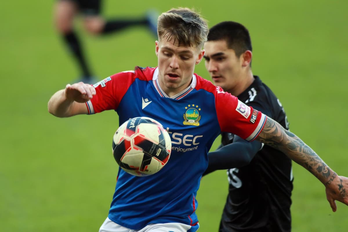 Linfield avoid Irish Cup shock as David Healy&#8217;s side recover from two-goal deficit to defeat Warrenpoint Town