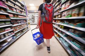 EMBARGOED TO 0001 WEDNESDAY JANUARY 4 File photo dated 03/09/22 of a shopper walking through the aisle of a Tesco supermarket, as food inflation has accelerated to record levels as many households suffered a "challenging Christmas" due to soaring prices, according to new figures.