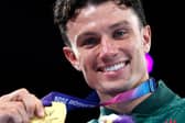 Boxer Jon McConnell showing off his gold medal following Commonwealth Games success in the ring. (Photo by Team NI)