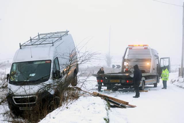A van which has come off the road close to Divis and Black Mountain. Picture by Jonathan Porter/PressEye