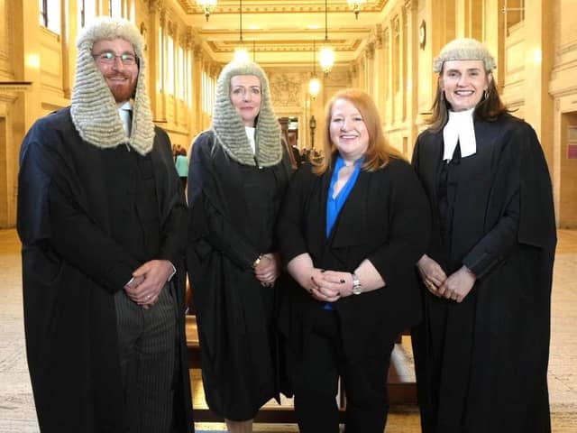 New KCs Steven McQuitty KC and Geraldine McCullough KC with Justice Minister Naomi Long MLA and chair of the Bar of NI Moira Smyth KC