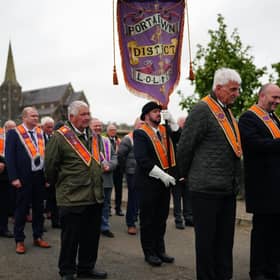 Orangemen make their way from Drumcree Church as police form a barricade to prevent them entering the Garvaghy Road. Sunday October 4, 2026.