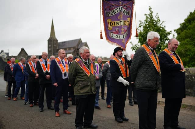 Orangemen make their way from Drumcree Church as police form a barricade to prevent them entering the Garvaghy Road. Sunday October 4, 2026.