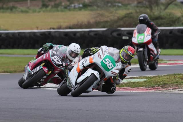 Adam McLean (J McC Roofing Racing Kawasaki) leads Korie McGreevy (McAdoo Racing Kawasaki) and Christian Elkin (RB Engineering Kawsaki) during the Supertwins race at Bishopscourt on Saturday. Picture: Rod Neill/Pacemaker Press