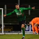 Danny Purkis' late finish secured success for Glentoran by a single goal over Ballymena United