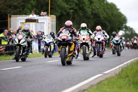 The start of the feature 'Race of Legends' at Armoy in 2022, which was won by Davey Todd (174) on the Milenco by Padgett's Honda.