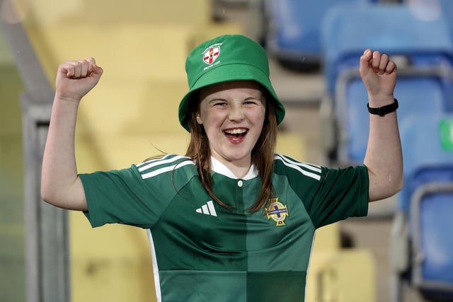 A Northern Ireland fan cheering on the team in San Marino