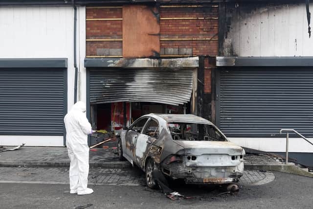 The scene at Pizza Guys on the Andersontown Road, west Belfast. Photo: Jonathan Porter/PressEye