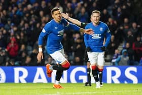 Rangers' James Tavernier (left) celebrates scoring his side's second goal of the game during the cinch Premiership match at the Ibrox Stadium, Glasgow.