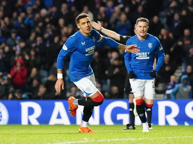 Rangers' James Tavernier (left) celebrates scoring his side's second goal of the game during the cinch Premiership match at the Ibrox Stadium, Glasgow.