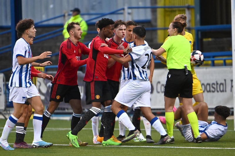 Manchester United and Hertha Berlin players clash at the end of the game