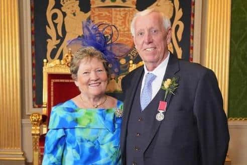 Robin Mercer BEM with his wife Edith, following a ceremony in Hillsborough Castle, where he was presented with his British Empire Medal by Lord Lieutenant Dame Fionnuala Jay-O'Boyle DBE