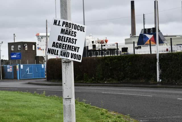 A deal on the Northern Ireland Protocol that does not address unionist concerns about the trading arrangements is bound to fail, a DUP MP has warned. Pictured is a protest sign at the port of Larne.
