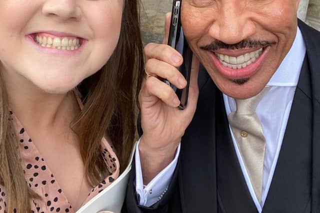 Claire outside Westminster Abbey with Lionel Ritchie