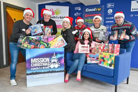Presenters from a number of radio stations in Northern Ireland who have released a Christmas single to raise money for a children's charity. The single and music video featuring radio presenters from Downtown and Cool FM will promote the Cash for Kids charity's annual Mission Christmas appeal. Picture: Simon Graham/PA Wire