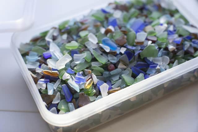 Bits of broken glass washed up on beaches in Co Antrim, by Craftswoman Colleen Douglas who creates jewellery and art has described her excitement after one of her, Tree of Life, pieces was presented to the Prince and Princess of Wales during a Royal visit to Carrickfergus. Picture date: Tuesday December 13 2021.