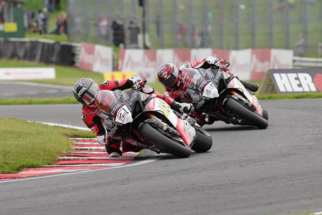 Glenn Irwin leads his BeerMonster Ducati team-mate and chief BSB title rival Tommy Bridewell at Oulton Park.