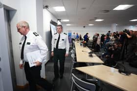 Police Service of Northern Ireland (PSNI) Chief Constable Simon Byrne (left) and Assistant Chief Constable Chris Todd leave after a press conference following an emergency meeting of the Northern Ireland Policing Board at James House in Belfast, following a data breach. Photo: Liam McBurney/PA Wire