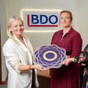 Steps taken by Northern Ireland advisory firm BDO NI to create a diverse and inclusive workplace for current and future staff members have been recognised with the awarding of a Bronze Diversity Mark. Pictured are Lorraine Nelson (tax director with BDO NI, Lisa McAleer, HR manager, BDO NI and Nuala Murphy (director at Diversity Mark)