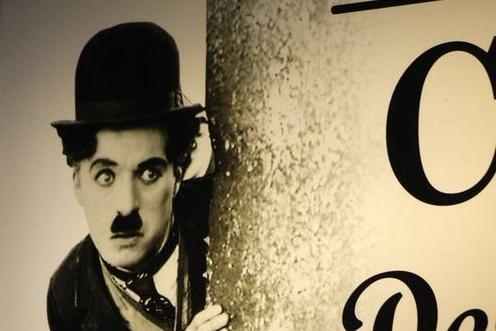Charlie Chaplin performed several times in Belfast. At 19-years, on April 27, 1908 he performed at the Palace of Varieties (name for the Grand Opera House between 1904-1909). A film scene with Charlie Chaplin is part of the logo of a kiosk in the Prenzlauer Berg district of Berlin