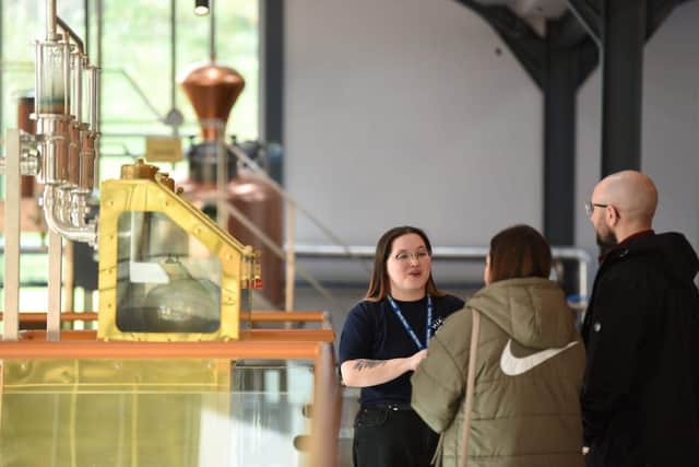 Becky Figueira talking to tour group at Hinch Distillery. Picture: Discover NI