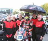 Dungannon teenager Jack Burrows on the Scars Racing Ducati with his dad John (second from right) and his team at Brands Hatch. (Photo credit: Scars Racing)