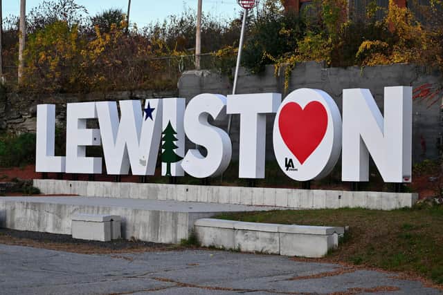 The Lewiston, Maine, city sign is seen with a heart on October 27, 2023, in the aftermath of a mass shooting. April Stevens, a Lewiston resident who knew one of the victims, said she was relieved to learn that the “monster and coward” who inflicted so much pain was no longer a danger.   (Photo by ANGELA WEISS / AFP) (Photo by ANGELA WEISS/AFP via Getty Images)