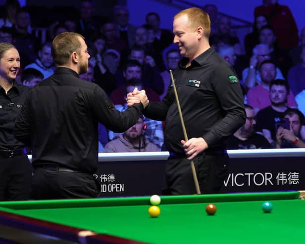 Jordan Brown (right) defeated Mark Allen in the first round of the Northern Ireland Open on Tuesday in Belfast. (Photo credit: World Snooker Tour)