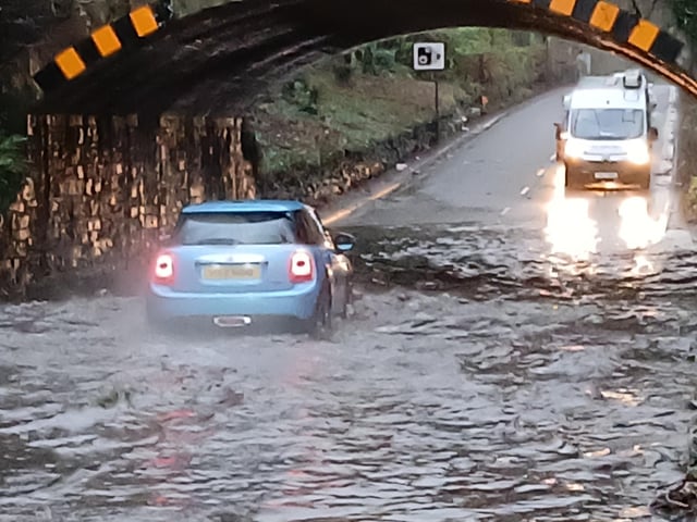 Most of the vehicles that tried to go through the flooding at Clandeboye were large four-wheel drive vehicles. But this mini boldly went through. Pic by Ben Lowry on Saturday January 17 2026