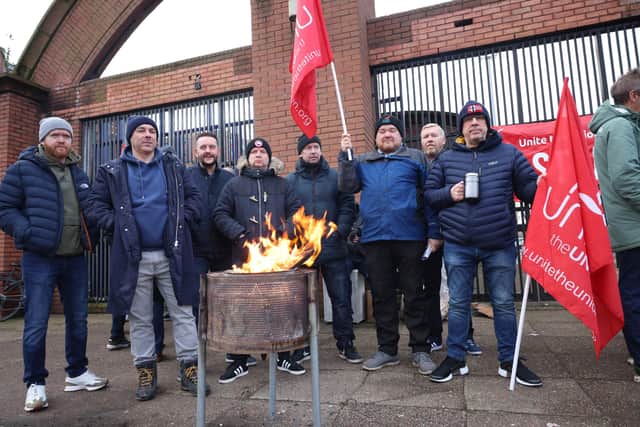 Transport workers on the picket line at Glengall Street bus depot on Thursday morning. Photo: Pacemaker