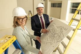 Northern Ireland hotel group Galgorm Collection has unveiled the latest phase of its ambitious £20m transformation. Pictured are Laura McCorry, chief executive, Tourism NI, and Colin Johnston, chief executive officer, Galgorm Collection, during a visit to Roe Valley Resort to view plans for the next phase of development at the resort