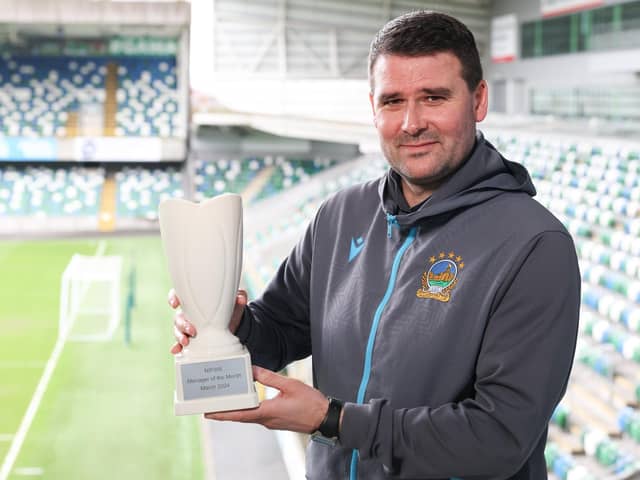 Linfield's David Healy with the Manager of the Month prize for March