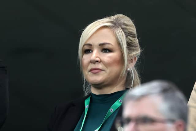 First Minister Michelle O'Neill stands for the national anthem before the UEFA Women's Nations League match at Windsor Park, Belfast, on Tuesday night