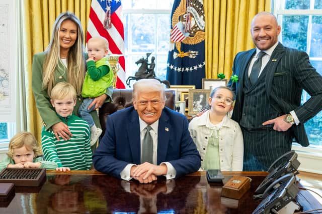 Conor McGregor poses for a photo with president Trump.